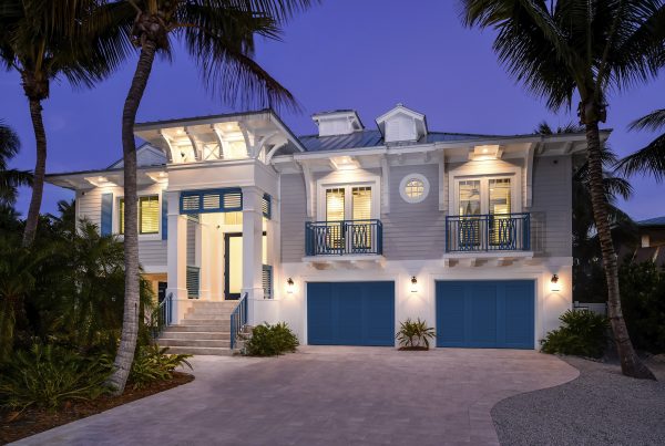 Clopay Canyon Ridge Louver garage doors on a home