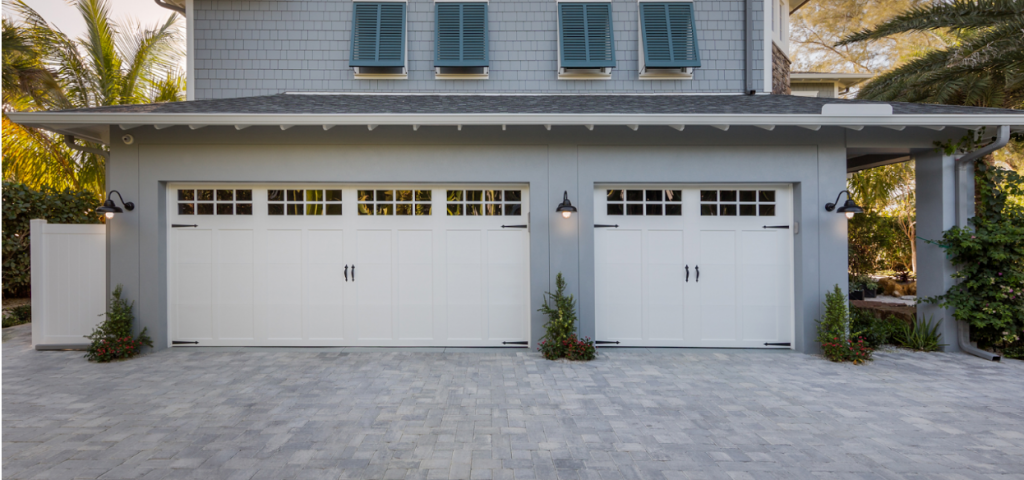 Garage door opener system being set up in a suburban home garage.